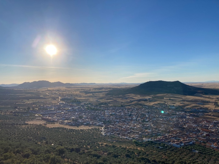 Panorma view over the spanish village Cabeza del Buey. Die sun is low in the sky.